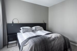 Postel nebo postele na pokoji v ubytování Reykjavik Residence Apartment Hotel