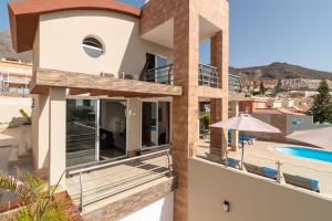 a villa with a view of the pool at Villa Sol in Adeje