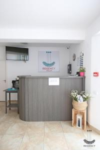 Kuchyň nebo kuchyňský kout v ubytování Regency Villa