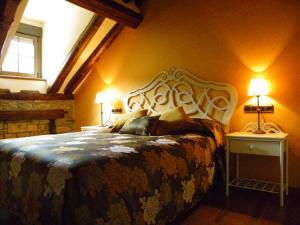 En eller flere senge i et værelse på El Balcon del Ara