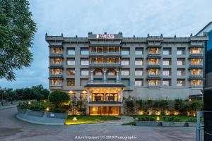 a rendering of the hotel trump philadelphia at dusk at Clarks Inn Suites Raipur in Raipur