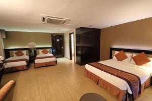 Letto o letti in una camera di The Guest Hotel & Spa