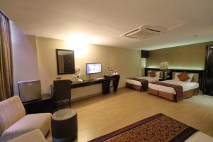 Televisyen dan/atau pusat hiburan di The Guest Hotel & Spa