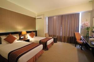 Letto o letti in una camera di The Guest Hotel & Spa