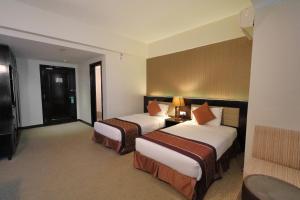 Letto o letti in una camera di The Guest Hotel & Spa
