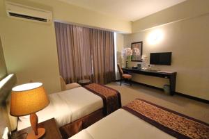 Letto o letti in una camera di The Guest Hotel & Spa