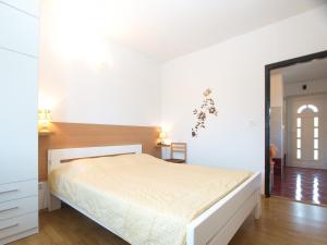 Ένα ή περισσότερα κρεβάτια σε δωμάτιο στο Apartment Liznjan 1969