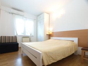 Ένα ή περισσότερα κρεβάτια σε δωμάτιο στο Apartment Liznjan 1969