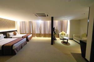 Letto o letti in una camera di The Guest Hotel & Spa