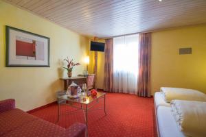 Letto o letti in una camera di Hotel La Cruna