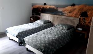Postel nebo postele na pokoji v ubytování Chambre La Caunette