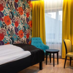 Postel nebo postele na pokoji v ubytování Thon Hotel Harstad