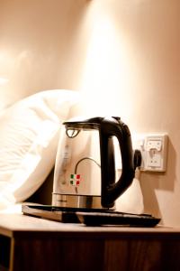 Postel nebo postele na pokoji v ubytování Hexa Hotel & Backpackers Capsules Bukit Bintang