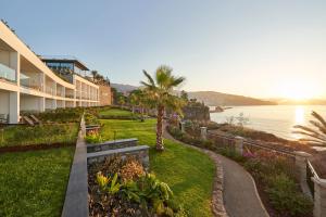 a view of the ocean from a resort at Les Suites at The Cliff Bay - PortoBay in Funchal