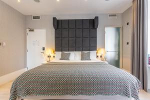 Katil atau katil-katil dalam bilik di The Inn on the Mile