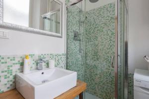 Kylpyhuone majoituspaikassa Guest House Rita