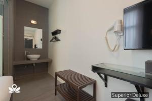 TV a/nebo společenská místnost v ubytování Ceria Hotel