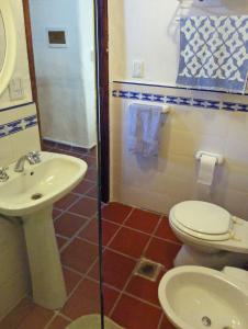 Phòng tắm tại El Faro de Carpier - ApartHotel & Restaurante Bar Cafetería