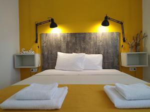 A bed or beds in a room at Aitherial Summer House