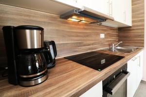 Køkken eller tekøkken på Ferienhaus Wis mit Sauna + 29 billeder