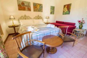 Posteľ alebo postele v izbe v ubytovaní B&B PALAZZI