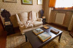 a living room with a couch and a coffee table at B&B PALAZZI in Florence