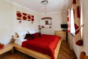 Postelja oz. postelje v sobi nastanitve Boutique Hotel Romantick