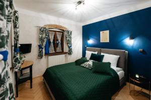 Postelja oz. postelje v sobi nastanitve Boutique Hotel Romantick