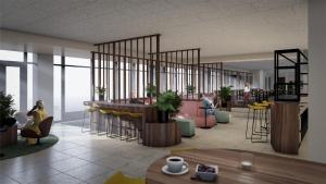 a rendering of a lobby with tables and chairs at Hardangerfjord Hotel in Øystese
