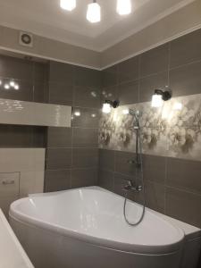 Koupelna v ubytování Затишні апартаменти в центрі міста