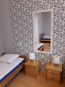 Posteľ alebo postele v izbe v ubytovaní Hostel Universus