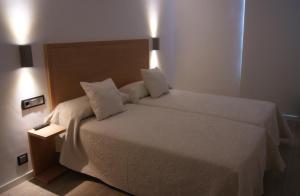 Posteľ alebo postele v izbe v ubytovaní Hotel EH Piedra Y Luz