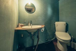 Ein Badezimmer in der Unterkunft Retreat Camp Mahoroba