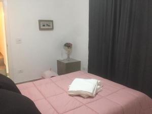 Llit o llits en una habitació de Linda Chácara - Águas de São Pedro - Próximo ao Parque Thermas