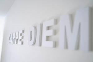 a white sign with the word alpha dog on it at Carpe diem Noguchi 201- Adults Only in Sint-Idesbald +2 photos