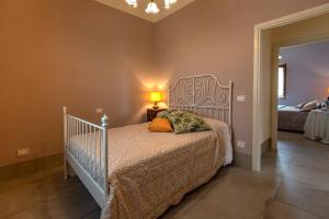 Posteľ alebo postele v izbe v ubytovaní Agriturismo Villa Ulivello in Chianti