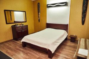 Posteľ alebo postele v izbe v ubytovaní Africa Apartment