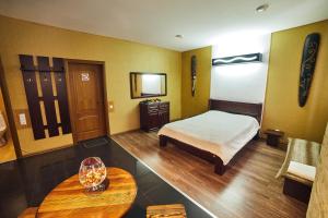 Posteľ alebo postele v izbe v ubytovaní Africa Apartment