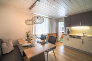 Kuchyňa alebo kuchynka v ubytovaní Alpenherz Apartments
