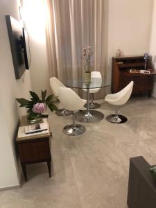 TV a/nebo společenská místnost v ubytování B&b estercarlo
