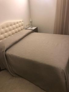 Voodi või voodid majutusasutuse B&b estercarlo toas