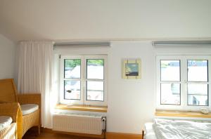 Ein Bett oder Betten in einem Zimmer der Unterkunft Wohnung 5 Haus Borgwardt