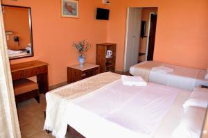 Voodi või voodid majutusasutuse Valais Hotel toas