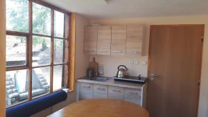 Cucina o angolo cottura di Lesní chaty "Hogo Fogo"