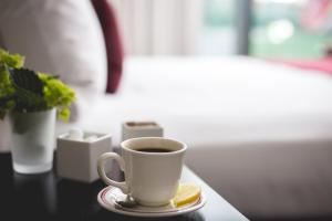 Postel nebo postele na pokoji v ubytování Hotel Commonwealth