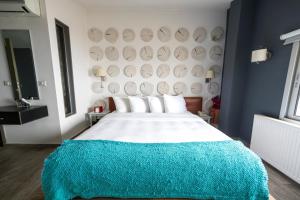 Postel nebo postele na pokoji v ubytování Urban Faqra Hotel