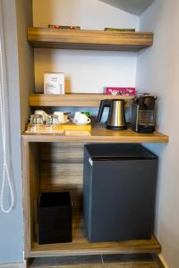 Kuchyň nebo kuchyňský kout v ubytování Urban Faqra Hotel