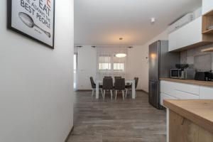 Kuchyň nebo kuchyňský kout v ubytování Apartment Ferias
