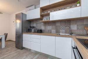 Kuchyň nebo kuchyňský kout v ubytování Apartment Ferias