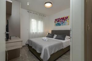 Postel nebo postele na pokoji v ubytování Apartment Ferias